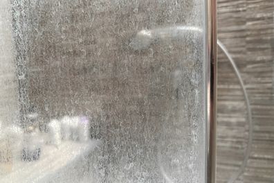 Why Shower Glass Gets Permanently Cloudy (And How to Restore It Without Replacing the Glass)?
